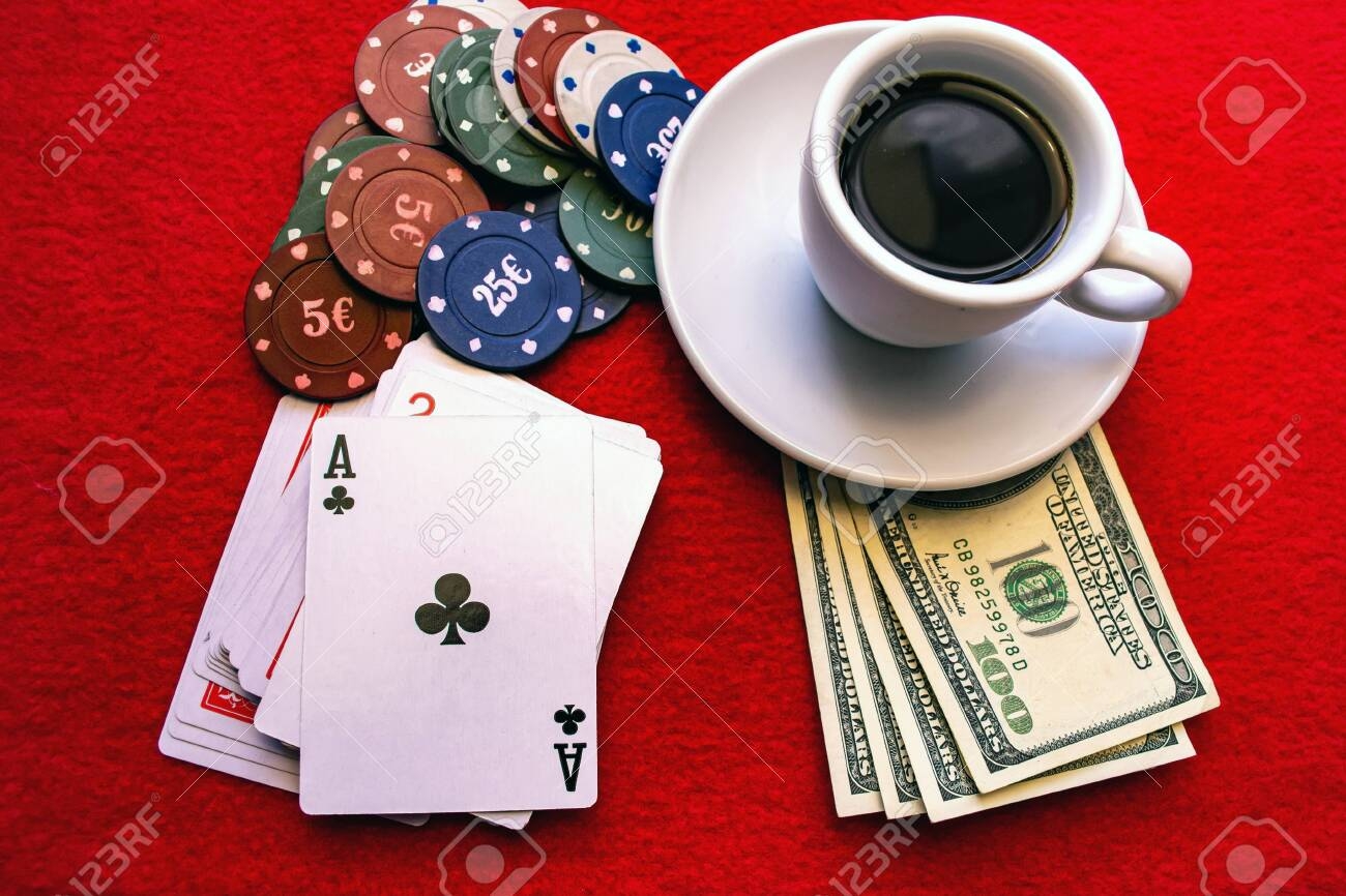Playing Cards With Chips A Cup Of Coffee On Dollars On A Red Background Stock Photo Picture And Royalty Free Image Image 139857585 